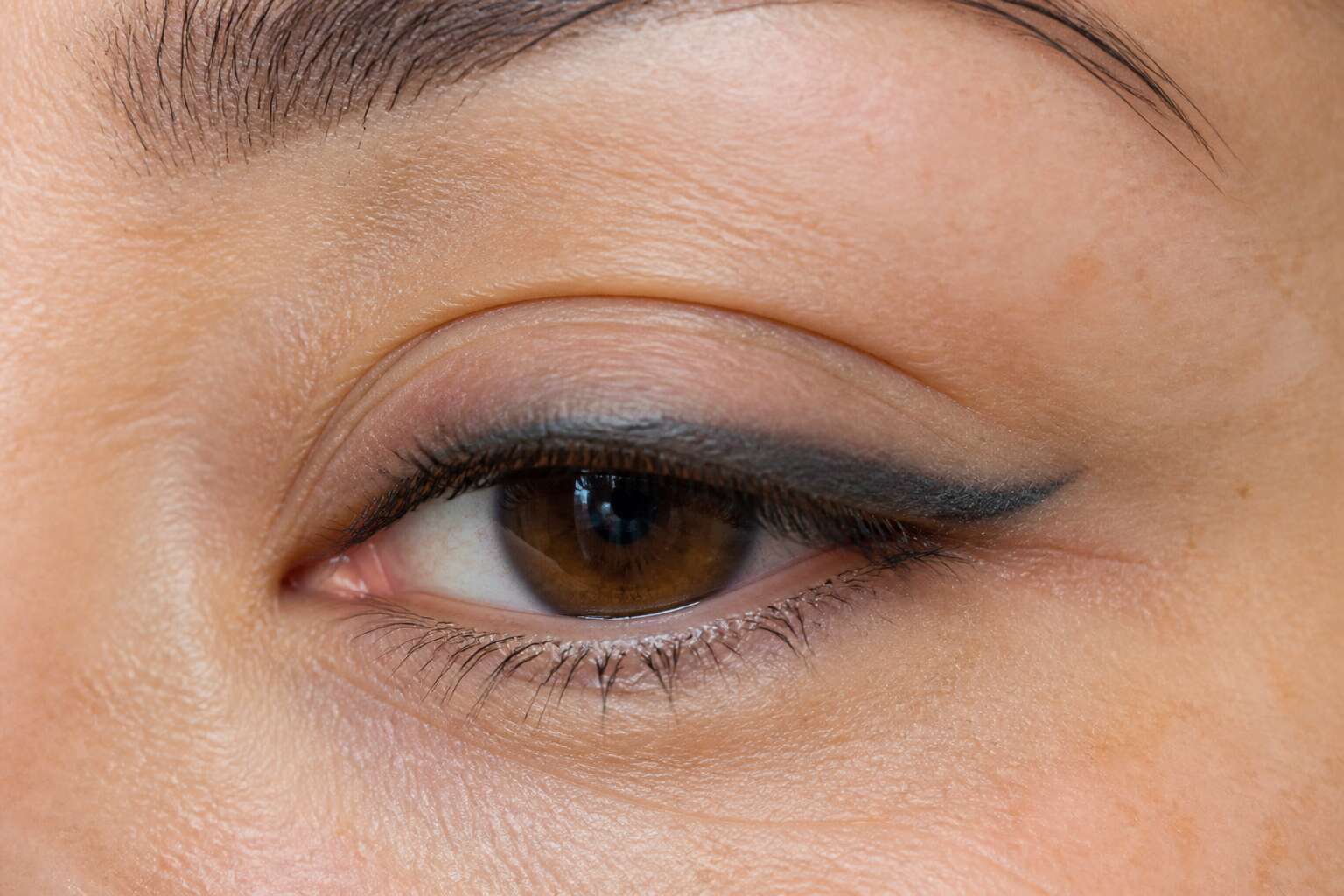 eyeliner tattoo aged